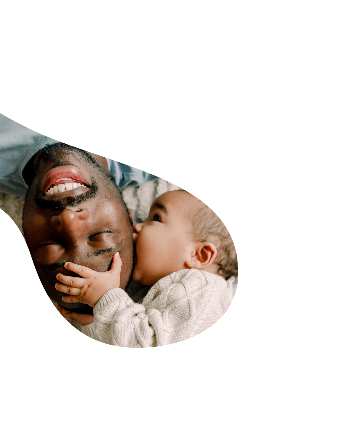 HCSC- An African Amer men smiles as his narrow child hugs his head