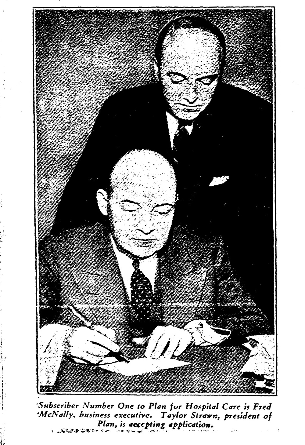 HCSC newspaper print of Fred McNally signing document